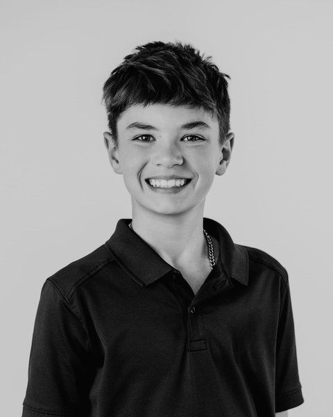 black and white school picture day portrait of a boy, Denver Colorado